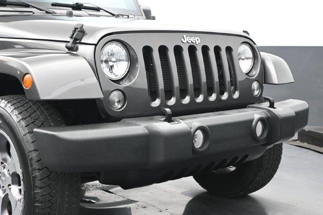 2016 Jeep Wrangler - $17,933