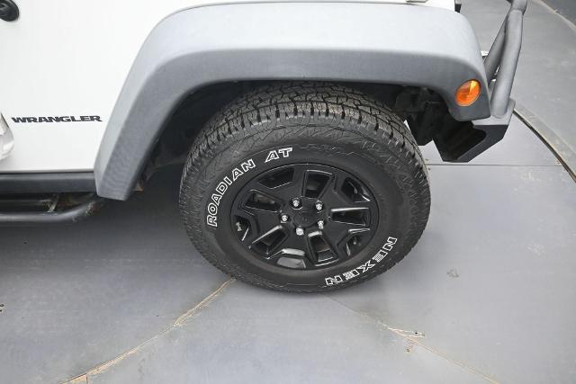 2015 Jeep Wrangler - $13,475
