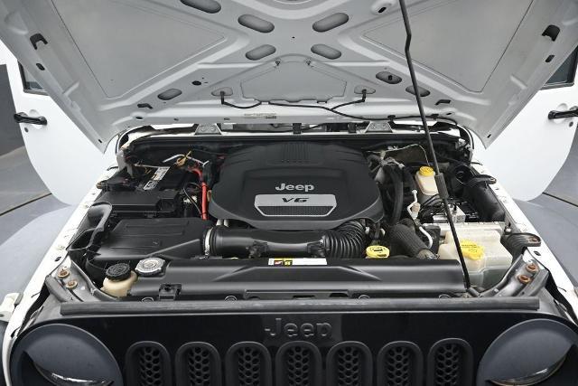 2015 Jeep Wrangler - $13,475