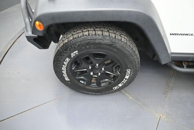 2015 Jeep Wrangler - $13,475