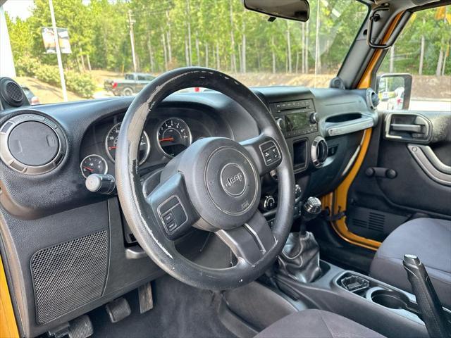 2014 Jeep Wrangler - $13,960