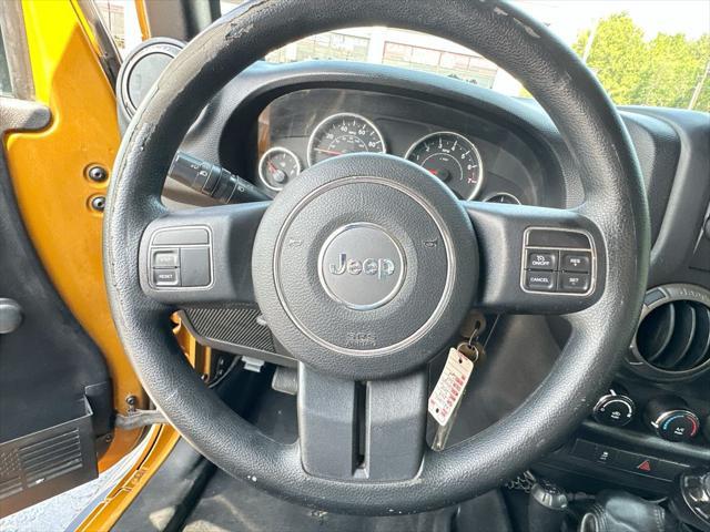 2014 Jeep Wrangler - $13,960