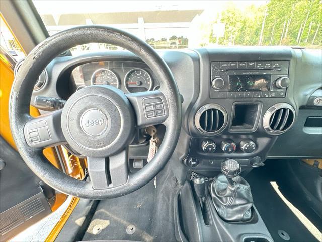 2014 Jeep Wrangler - $13,960