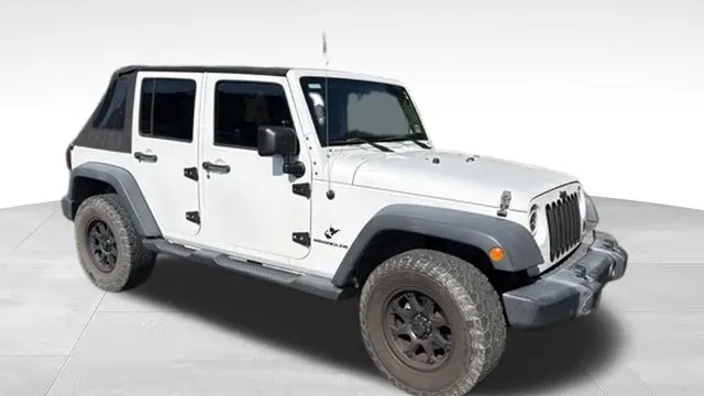 Preowned 2013 Jeep Wrangler Unlimited Freedom Edition for Sale