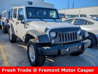 2014 Jeep Wrangler Unlimited with Bright White Clearcoat Exterior
