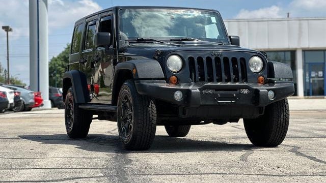 Preowned 2013 Jeep Wrangler Unlimited Sahara for Sale