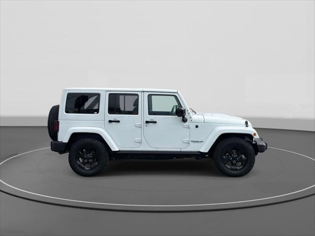 2015 Jeep Wrangler - $20,423