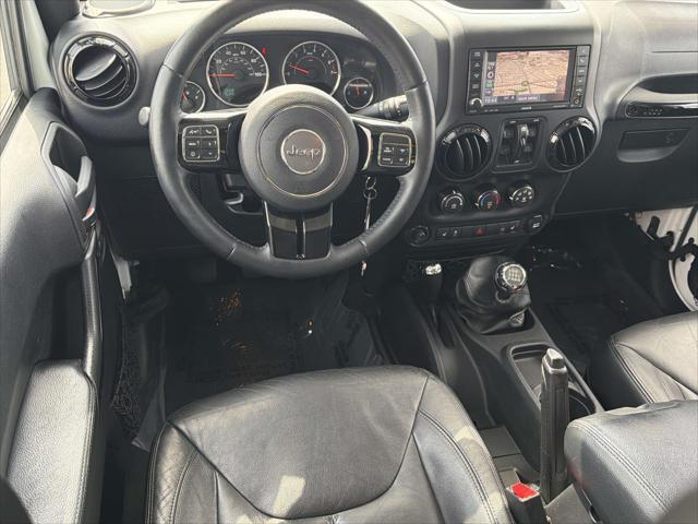 2015 Jeep Wrangler - $20,423