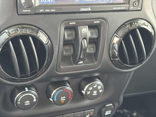 2015 Jeep Wrangler - $20,423
