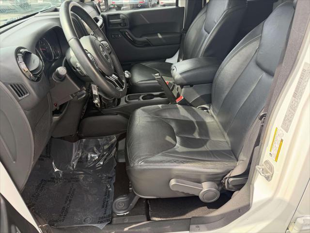 2015 Jeep Wrangler - $20,423