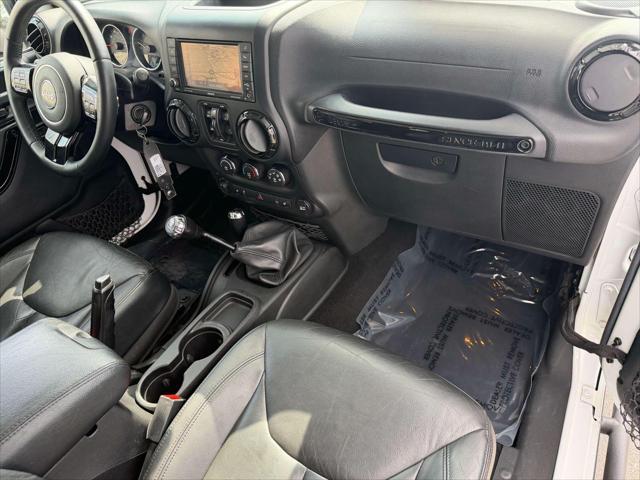 2015 Jeep Wrangler - $20,423