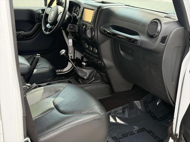 2015 Jeep Wrangler - $20,423