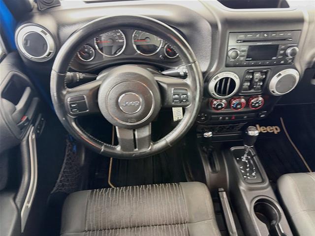 2012 Jeep Wrangler - $15,000