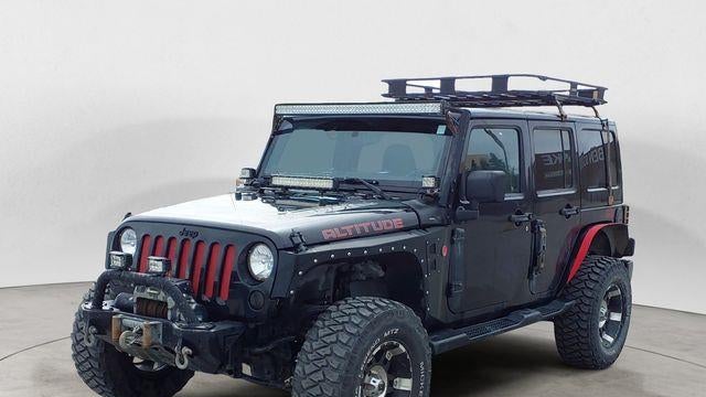 Preowned 2012 Jeep Wrangler Unlimited Sahara for Sale