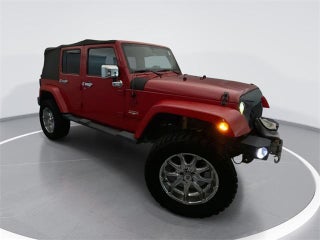 2014 Jeep Wrangler Unlimited with Flame Red Clearcoat Exterior