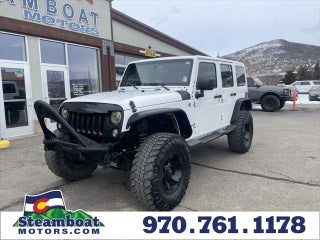 2015 Jeep Wrangler Unlimited with Bright White Clearcoat Exterior
