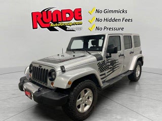 2012 Jeep Wrangler Unlimited with Bright Silver Metallic Exterior