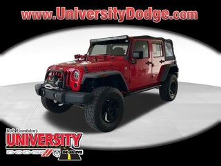 2014 Jeep Wrangler Unlimited with Firecracker Red Clear Coat Exterior