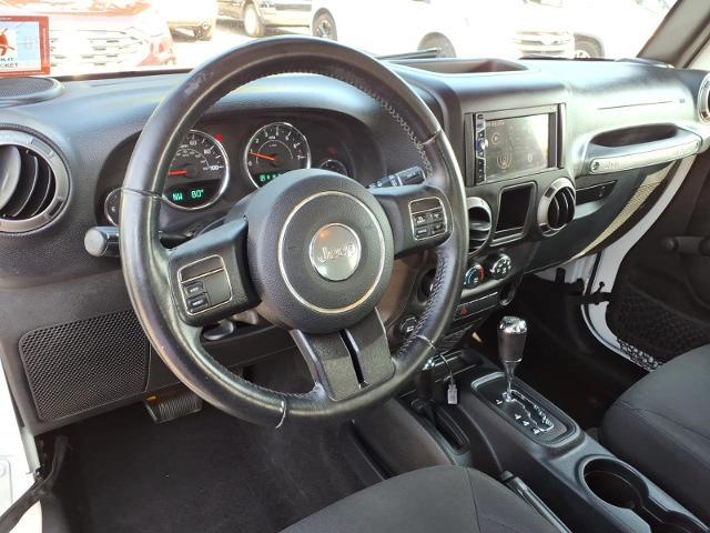 2016 Jeep Wrangler - $13,997