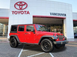 2018 Jeep Wrangler JK Unlimited with Firecracker Red Clearcoat Exterior