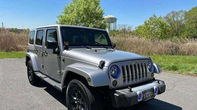 Preowned 2014 Jeep Wrangler Unlimited Sahara for Sale
