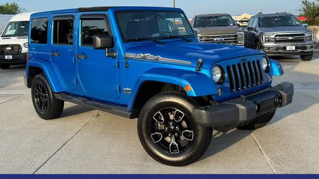 Preowned 2014 Jeep Wrangler Unlimited Sahara for Sale