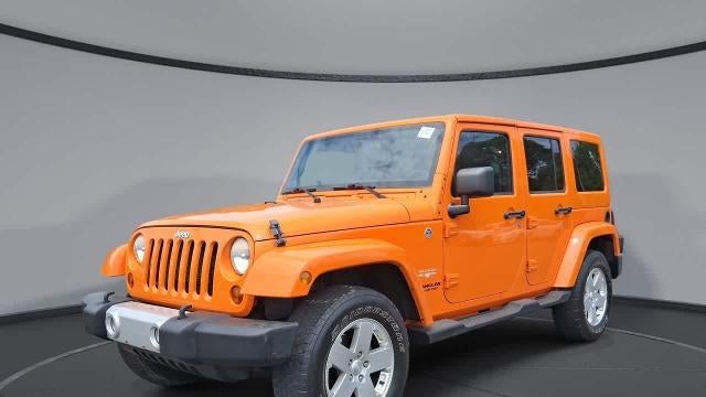 Preowned 2012 Jeep Wrangler Unlimited Sahara for Sale