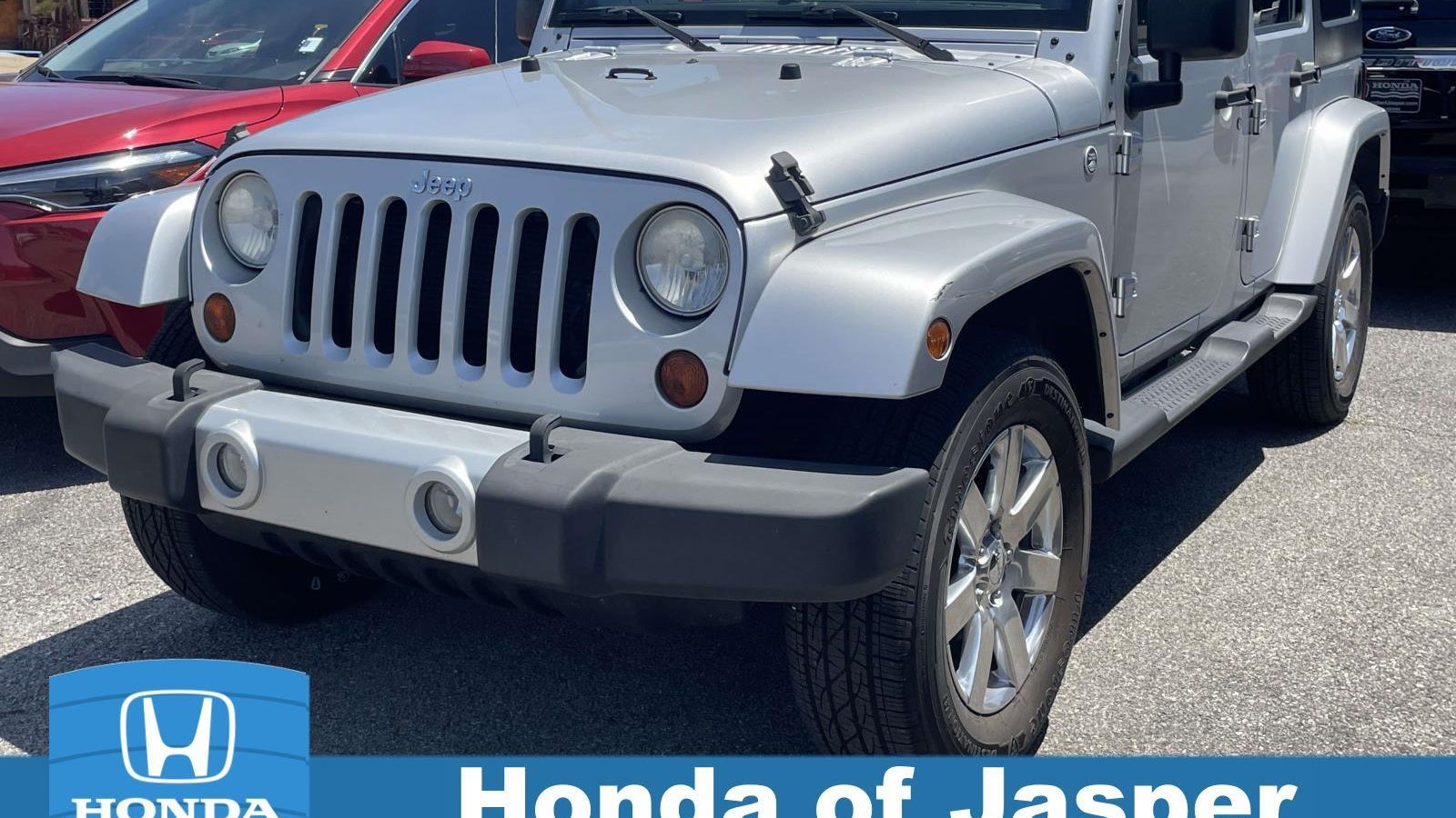 Preowned 2012 Jeep Wrangler Unlimited Sahara for Sale