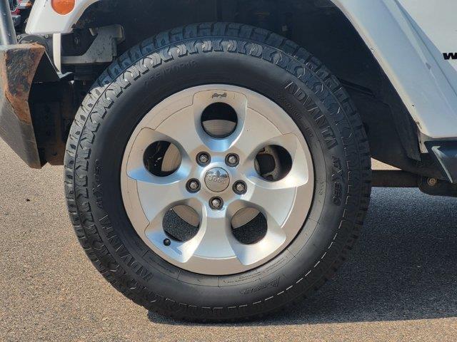 2014 Jeep Wrangler - $15,749