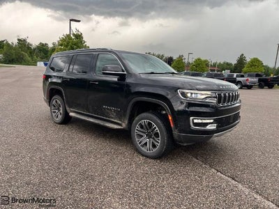Photo of a 2022 Jeep Wagoneer 4X4 Series III Carbide 4DR SUV for sale