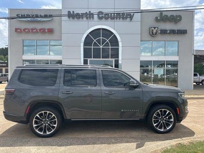 Photo of a 2022 Jeep Wagoneer 4X4 Series III Carbide 4DR SUV for sale
