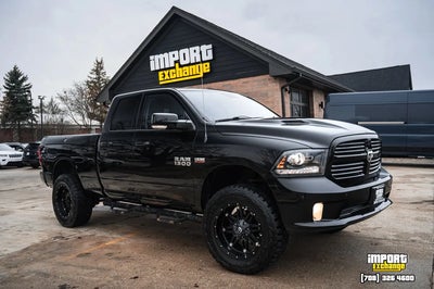 Photo of a 2014 RAM 1500 4X4 Sport 4DR Quad Cab 6.3 FT. SB Pickup for sale
