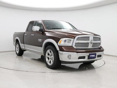Photo of a 2015 RAM 1500 4X4 Laramie 4DR Quad Cab 6.3 FT. SB Pickup for sale