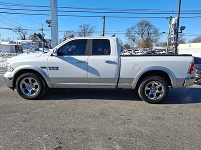 Photo of a 2015 RAM 1500 4X4 Laramie 4DR Quad Cab 6.3 FT. SB Pickup for sale