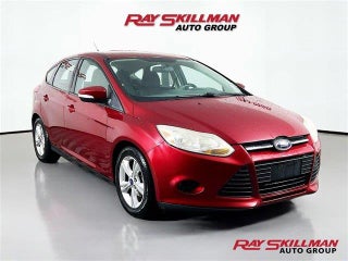 2013 Ford Focus with Ruby Red Metallic Tinted Clear Exterior