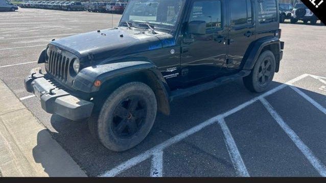 Preowned 2011 Jeep Wrangler Unlimited Sahara for Sale