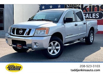Photo of a 2010 Nissan Titan 4X4 LE 4DR Crew Cab SWB Pickup for sale