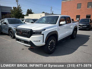 2023 Nissan Frontier with Glacier White Exterior
