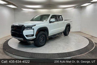 2025 Nissan Frontier with Glacier White Exterior
