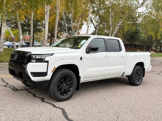 2026 Nissan Frontier with Glacier White Exterior