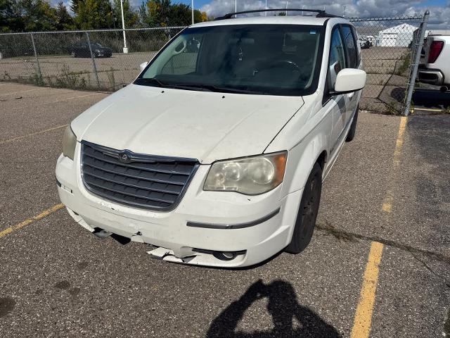 2010 Chrysler Town And Country - $2,180