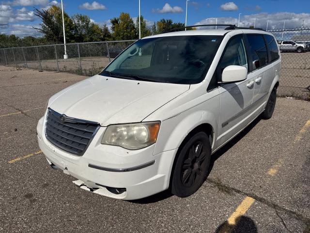 2010 Chrysler Town And Country - $2,180