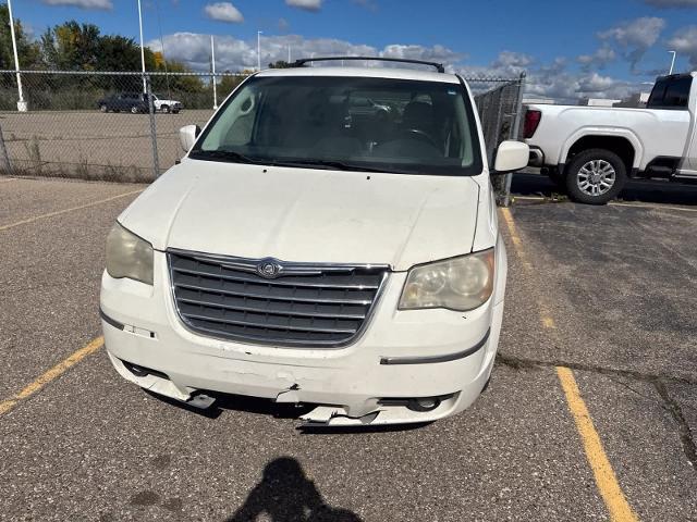 2010 Chrysler Town And Country - $2,180