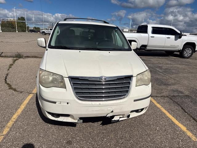 2010 Chrysler Town And Country - $2,180