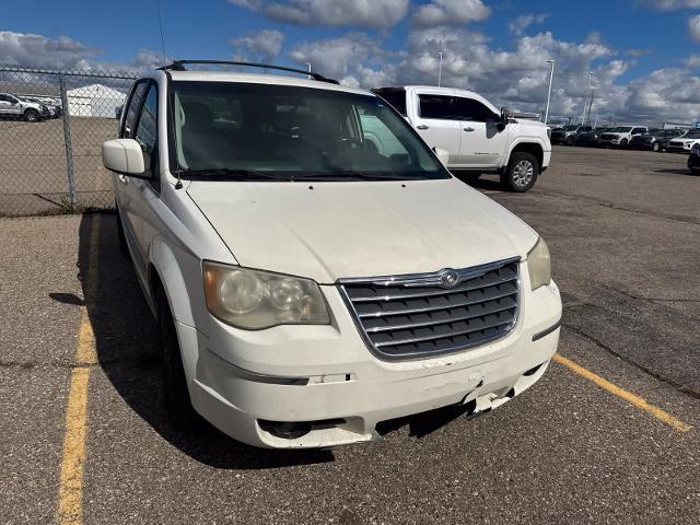 2010 Chrysler Town And Country - $2,180