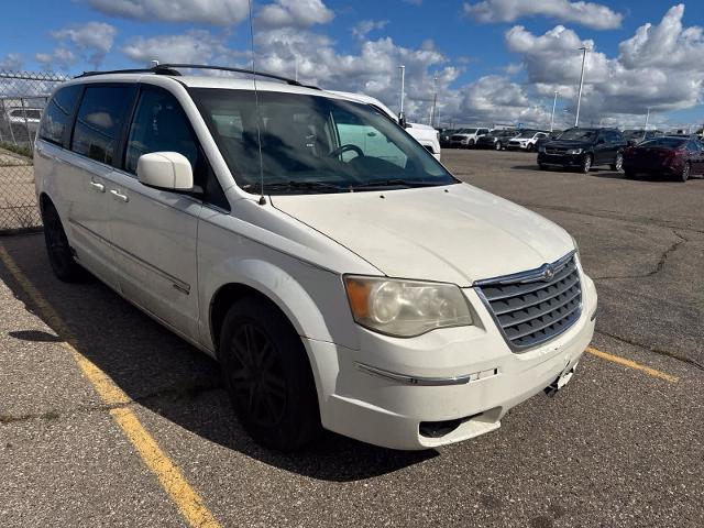 2010 Chrysler Town And Country - $2,180