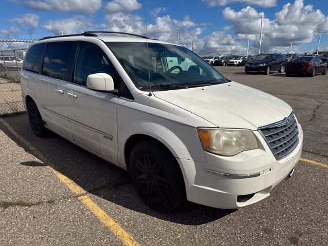 2010 Chrysler Town And Country - $2,180