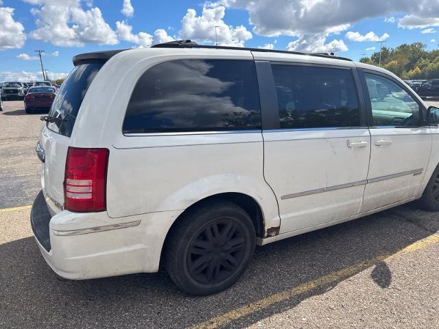 2010 Chrysler Town And Country - $2,180