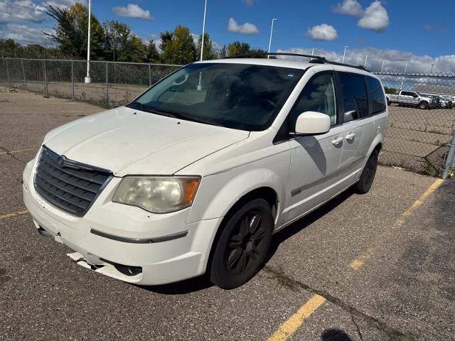 2010 Chrysler Town And Country - $2,180
