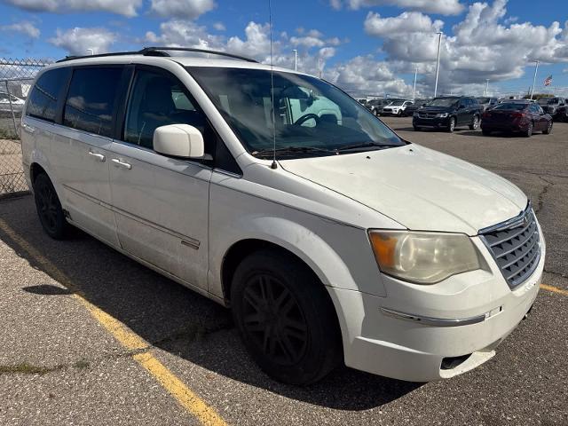 2010 Chrysler Town And Country - $2,180